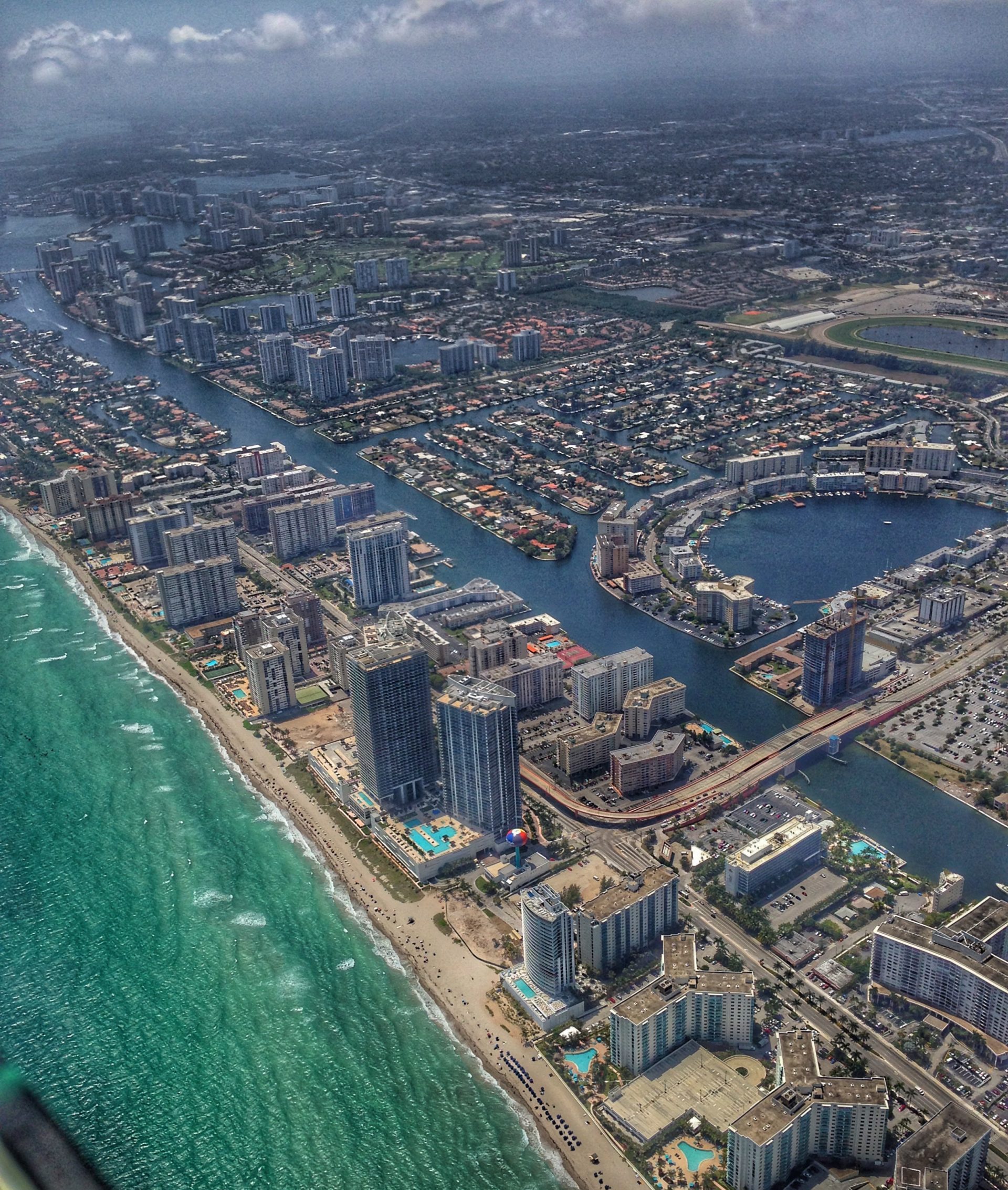 Arial view of modern city on beach.